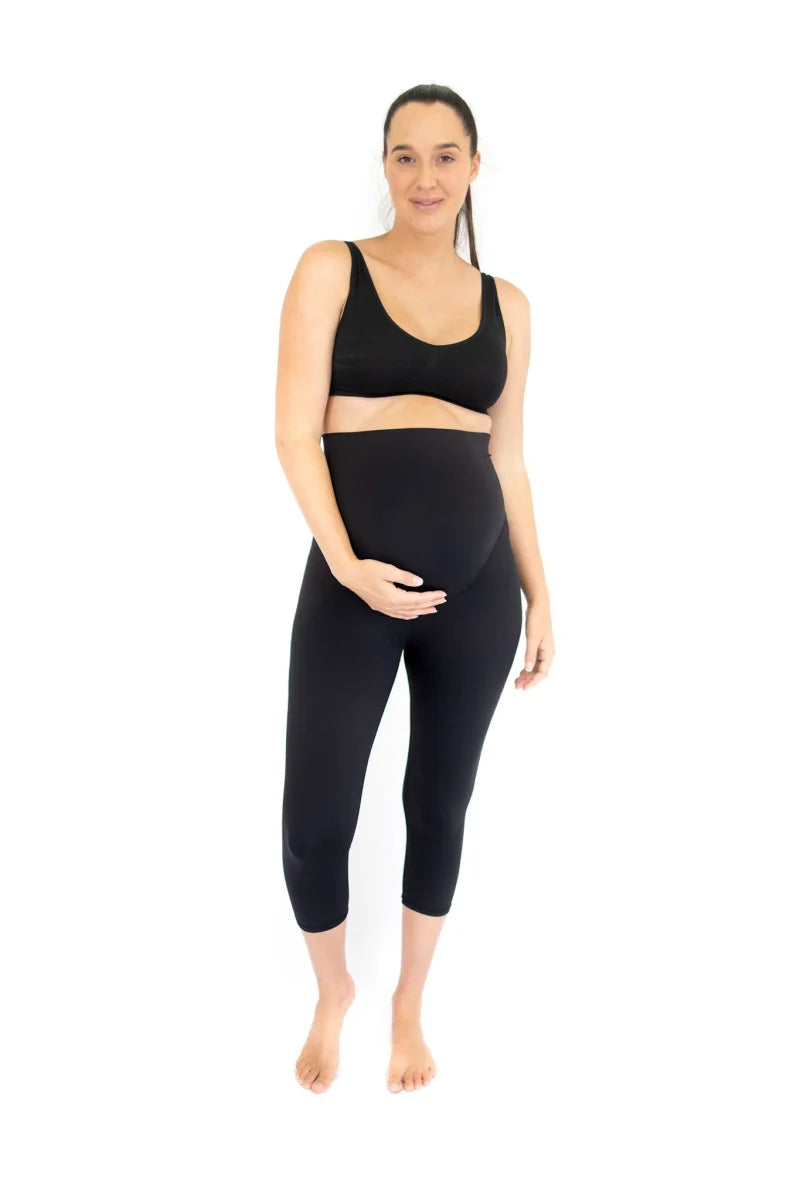 A woman looking comfortable and confident in stylish activewear, embracing the everyday hustle of motherhood.